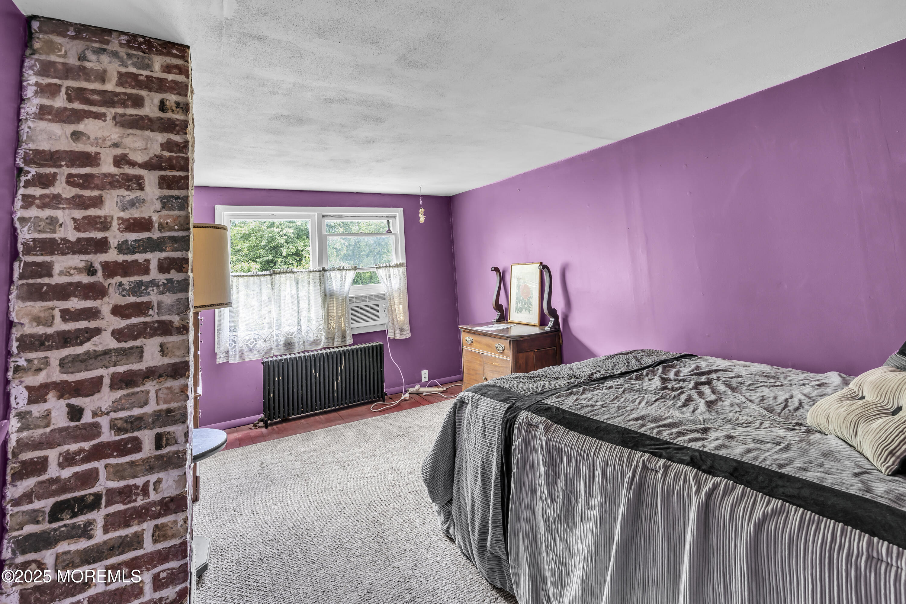 200 Cranberry Road Farmingdale, NJ 07727 - Photo 39 of 72 a bedroom with a bed and a window