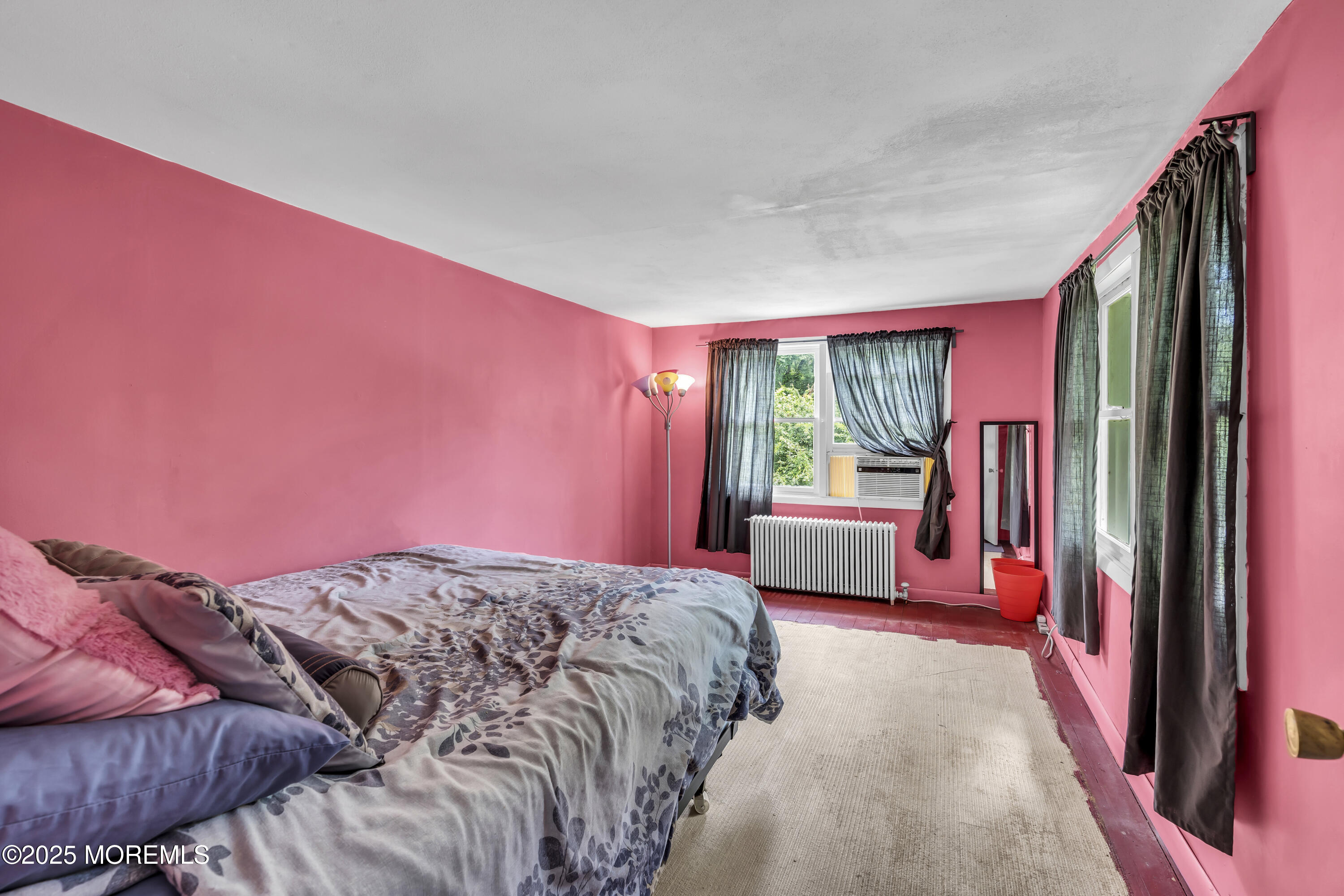 200 Cranberry Road Farmingdale, NJ 07727 - Photo 41 of 72 a bedroom with a bed and a window