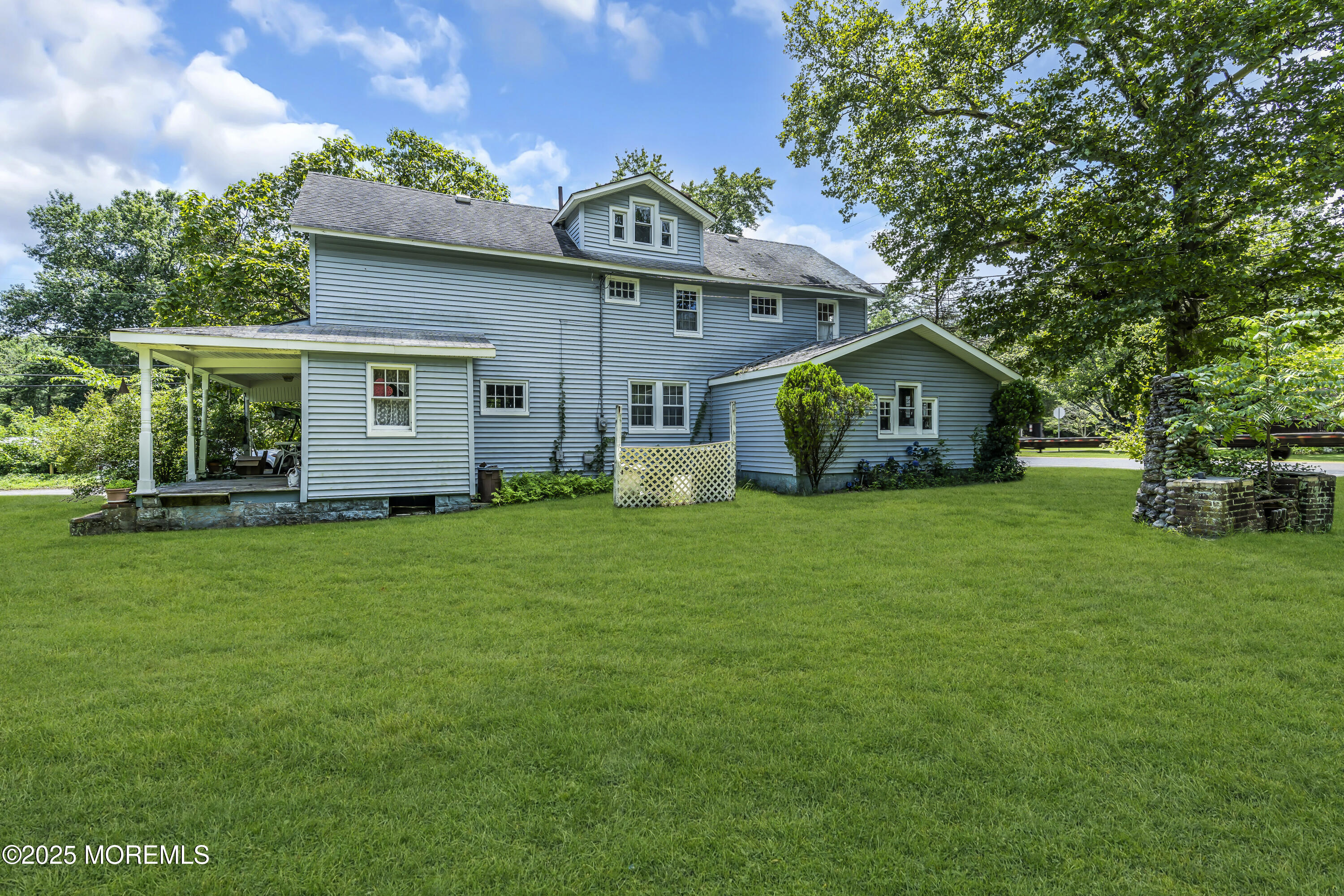 200 Cranberry Road Farmingdale, NJ 07727 - Photo 46 of 72 a front view of house with yard and green space
