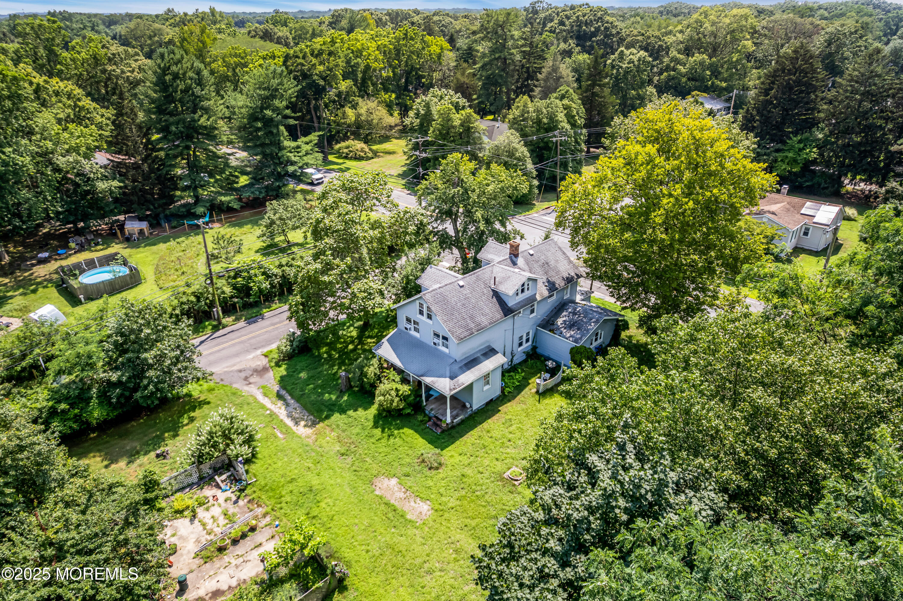 200 Cranberry Road Farmingdale, NJ 07727 - Photo 54 of 72 an aerial view of a house with a garden