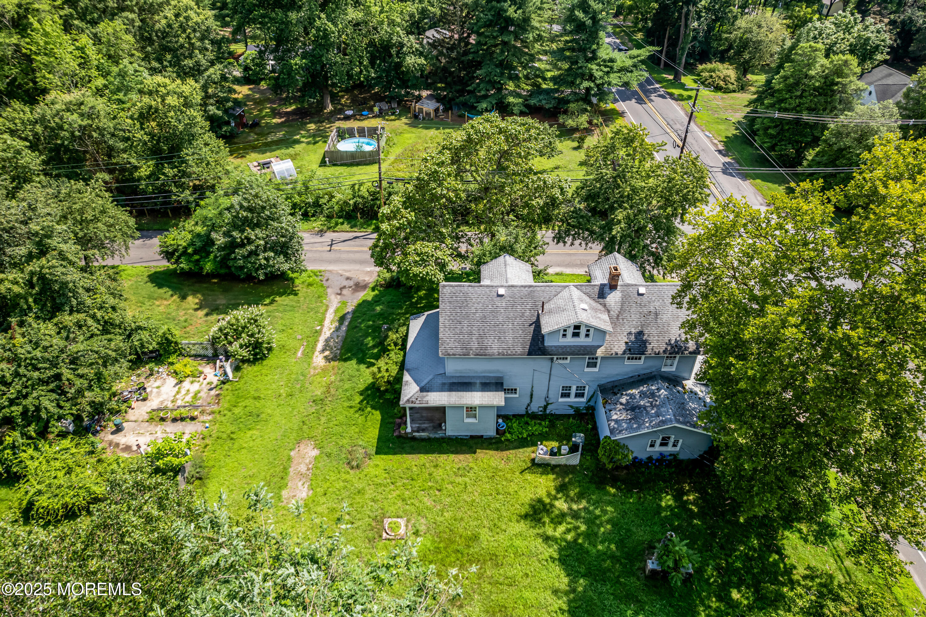 200 Cranberry Road Farmingdale, NJ 07727 - Photo 55 of 72 an aerial view of a house with a garden
