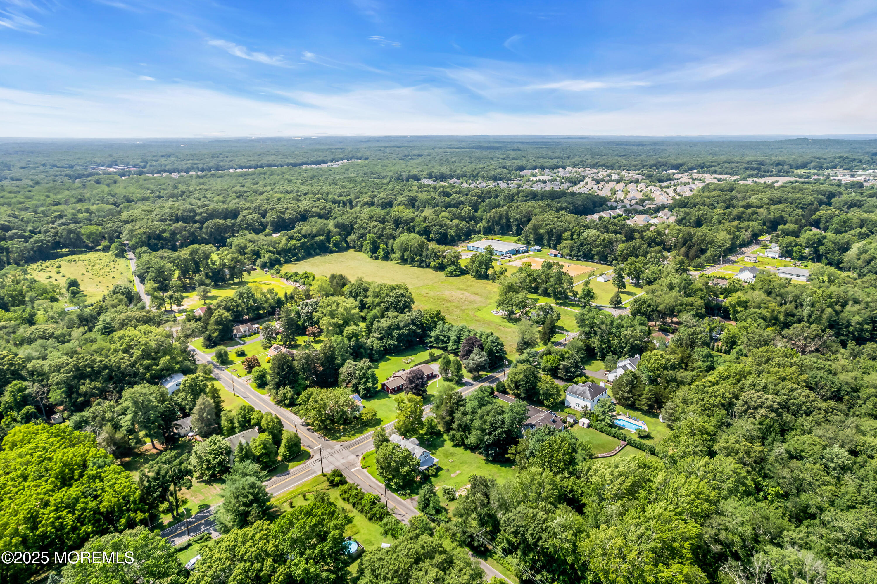 200 Cranberry Road Farmingdale, NJ 07727 - Photo 58 of 72 an aerial view of a residential houses with city view