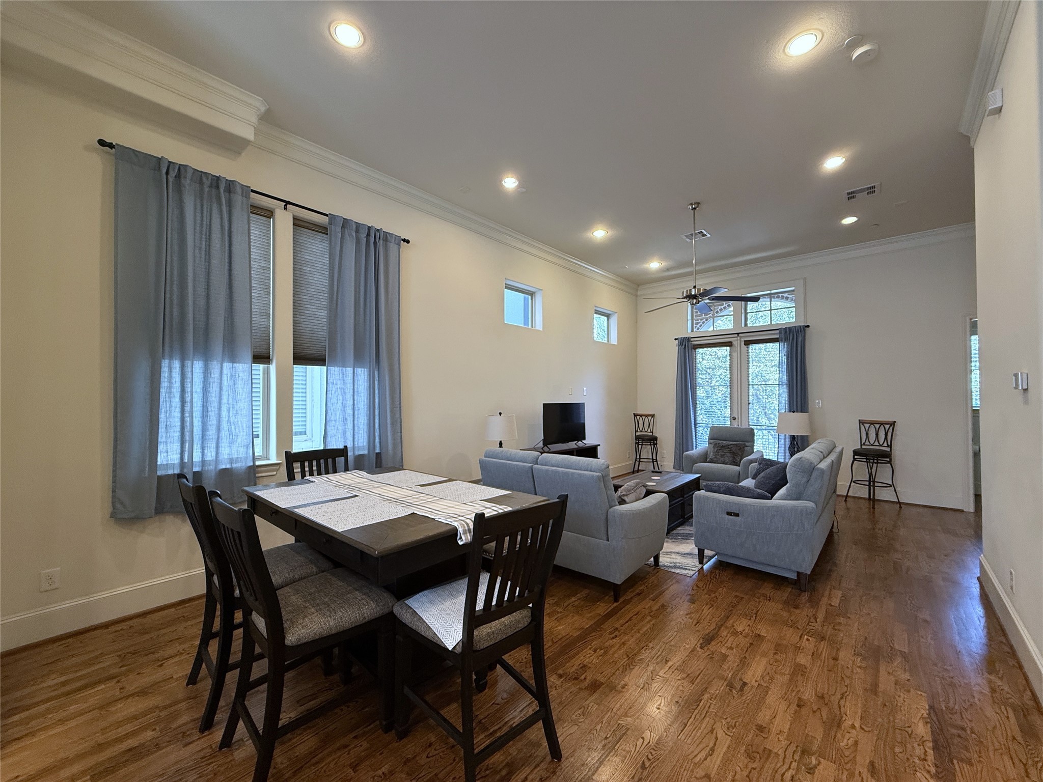 705 Delano Street Houston, TX 77003 - Photo 12 of 28 a view of a dining room with furniture window and wooden floor
