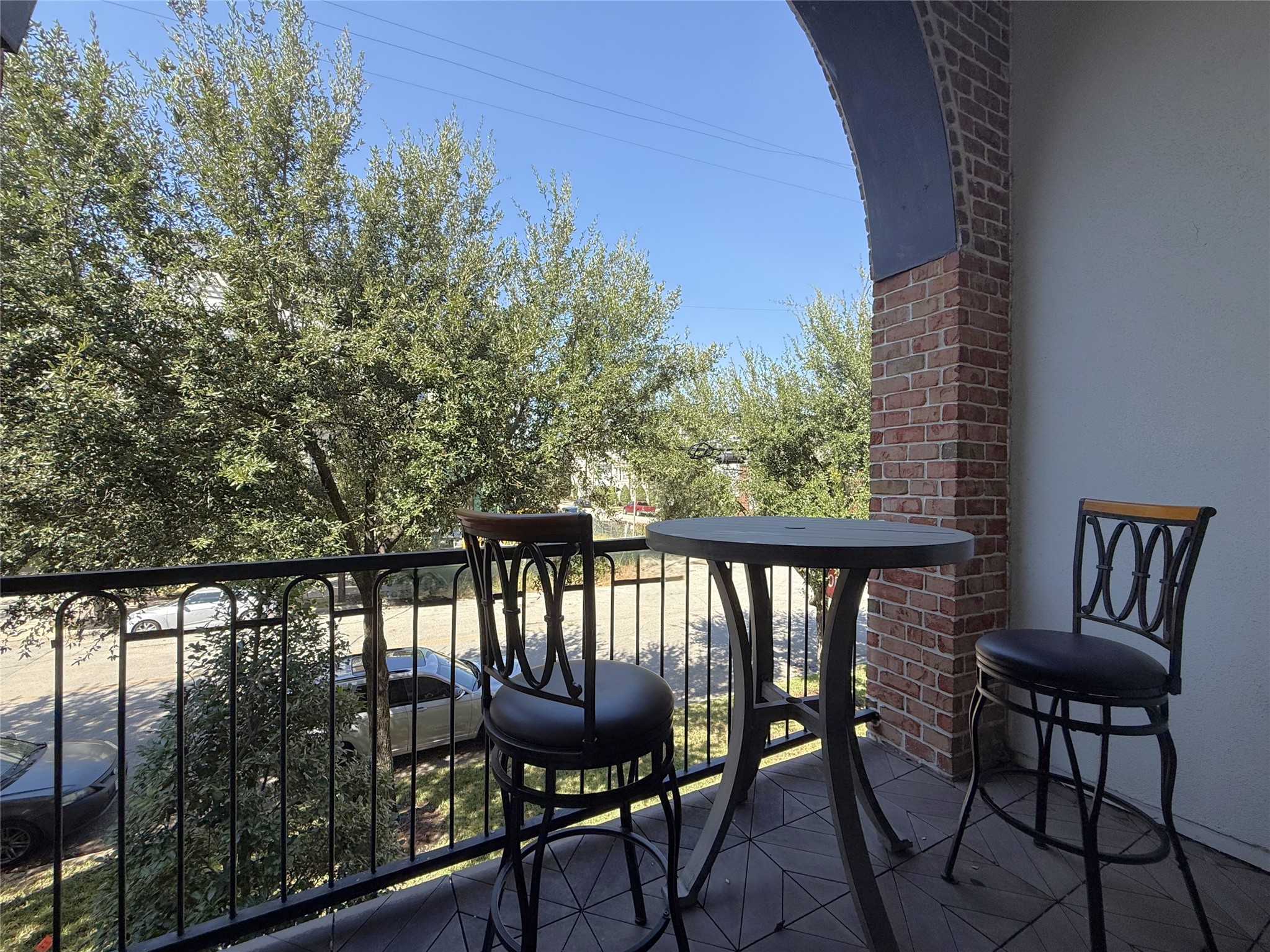 705 Delano Street Houston, TX 77003 - Photo 13 of 28 a view of a balcony with chairs
