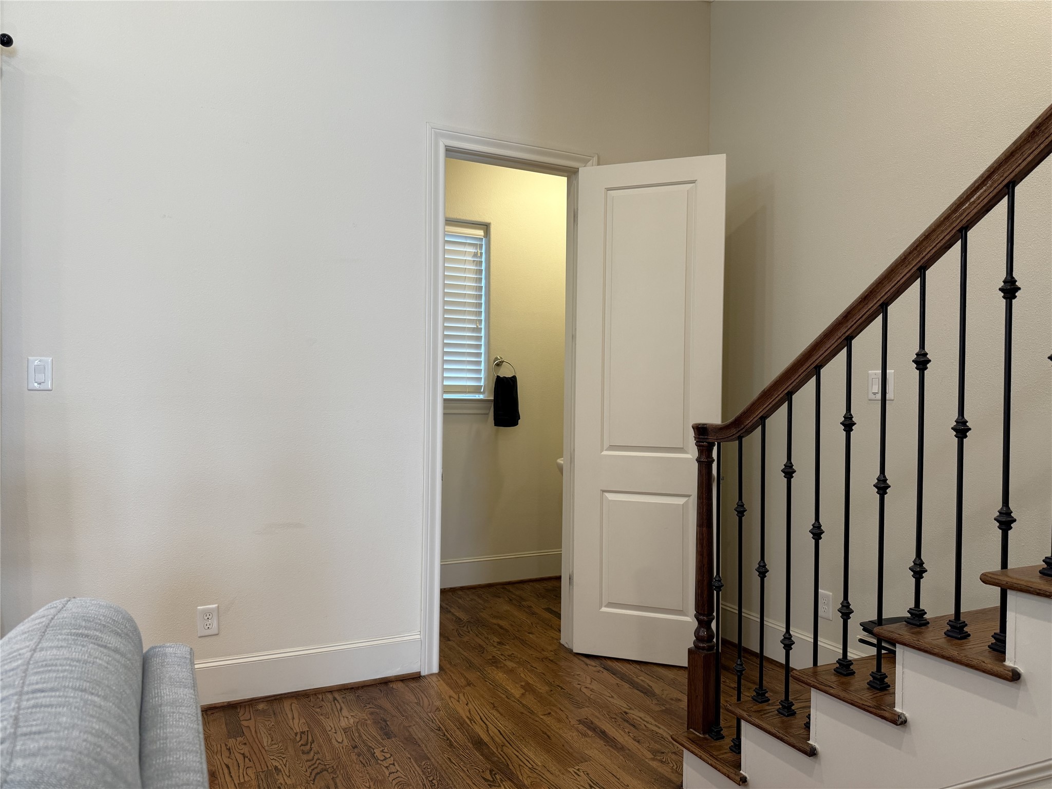 705 Delano Street Houston, TX 77003 - Photo 14 of 28 a view of a room with wooden floor and stairs