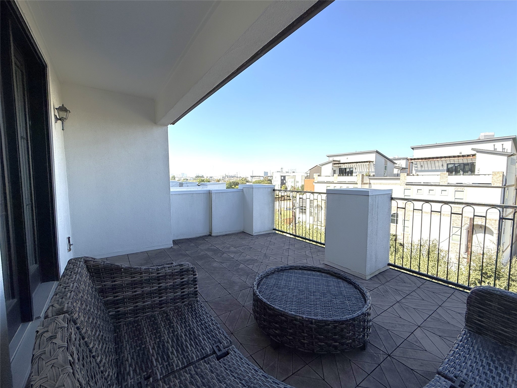 705 Delano Street Houston, TX 77003 - Photo 25 of 28 a living room with furniture and a window