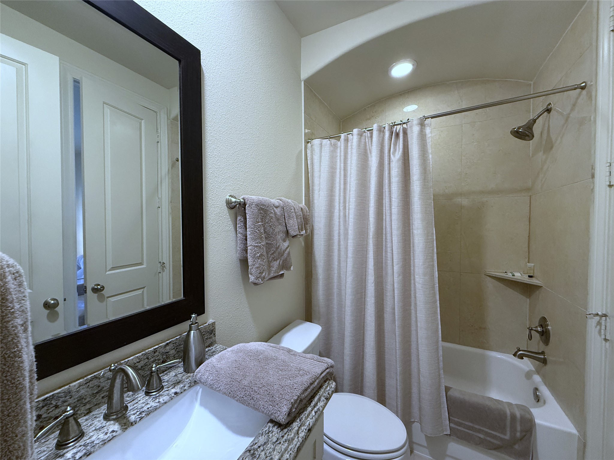 705 Delano Street Houston, TX 77003 - Photo 5 of 28 a bathroom with a sink toilet and shower