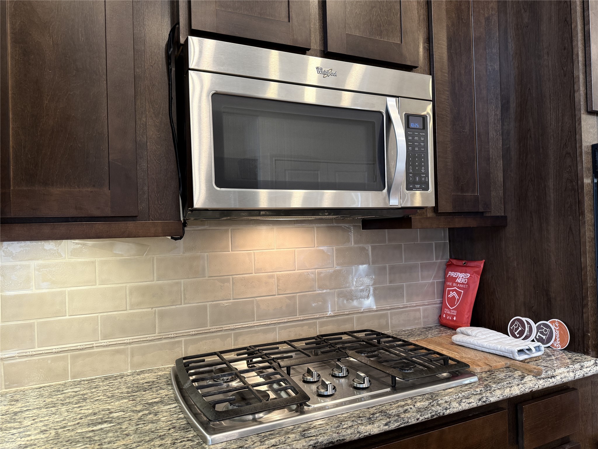705 Delano Street Houston, TX 77003 - Photo 8 of 28 a stove top oven sitting inside of a kitchen