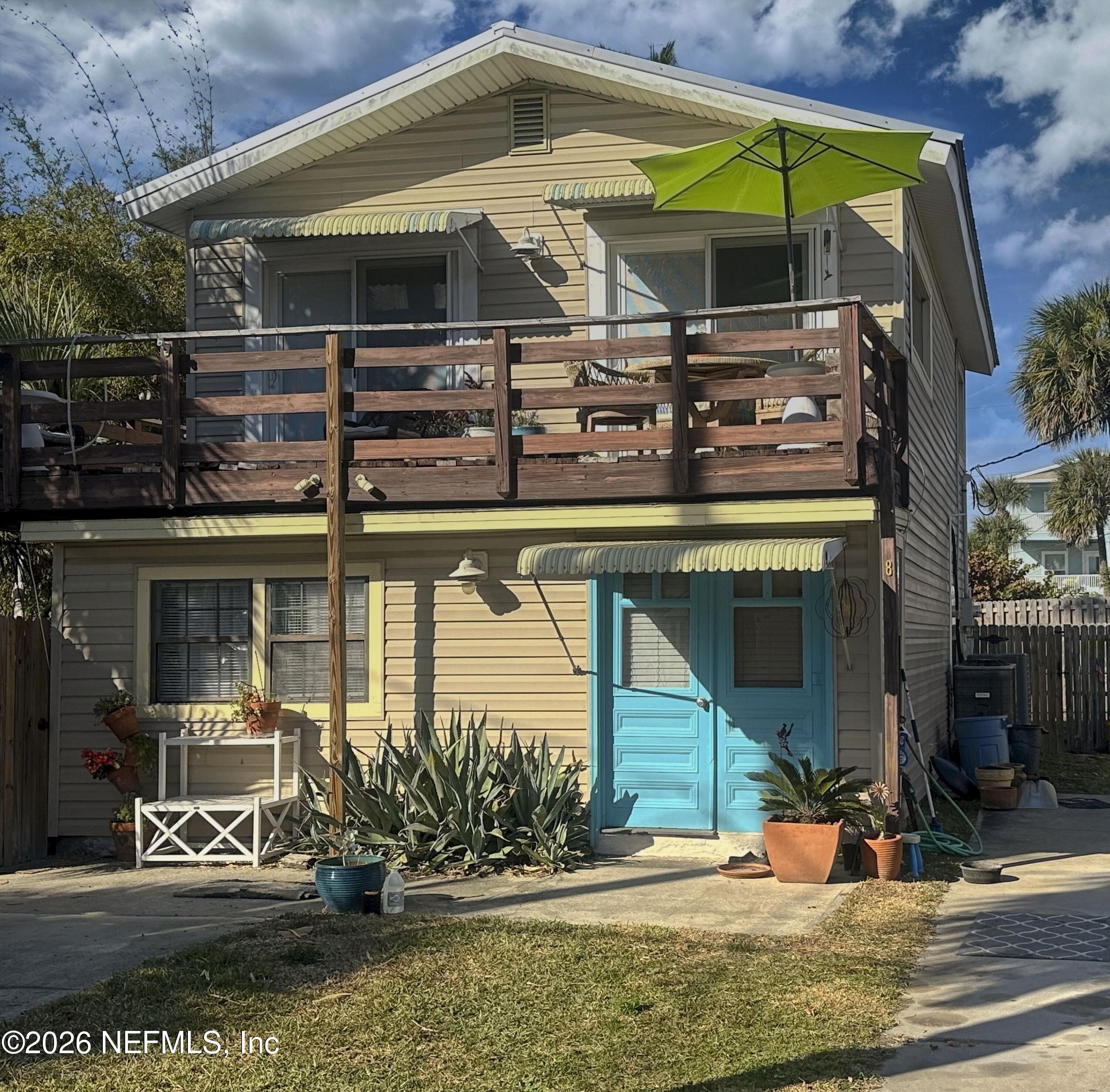8 10th Street, Unit B St. Augustine, FL 32080 - Photo 14 of 14 a view of a two door with sitting area