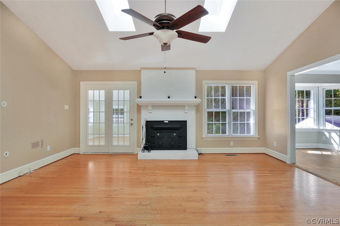 11452 Rolling Brook Road Chester, VA 23831 - Photo 2 of 23 a view of an empty room with a window and kitchen view