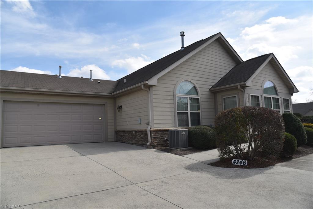 4246 Plantation Ridge Lane Greensboro, NC 27409 - Photo 2 of 30 Garage side of home