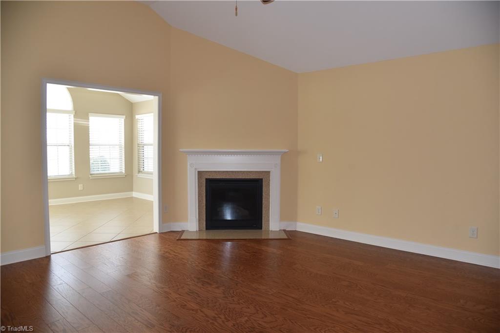 4246 Plantation Ridge Lane Greensboro, NC 27409 - Photo 6 of 30 Living room with gas log fireplace