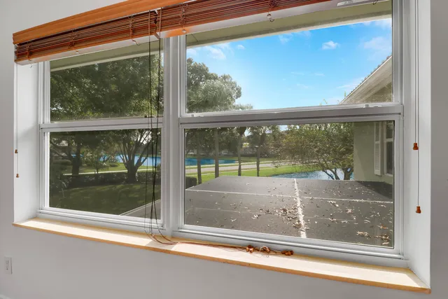 a view of a glass door with a glass door and a window