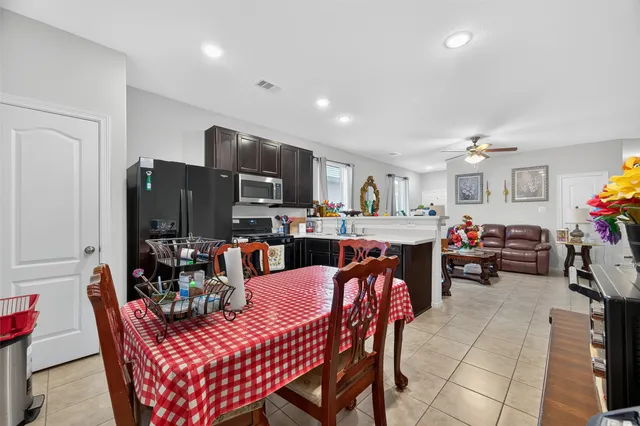 a view of a dining room with furniture