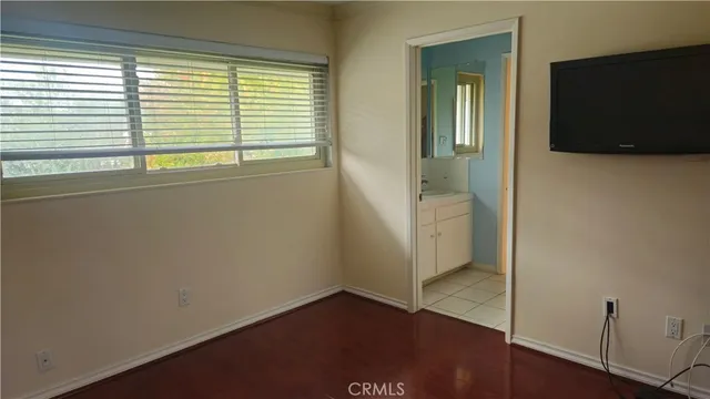a view of a bedroom from a hallway