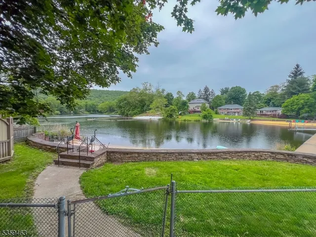 a lake view with a sitting space and a lake view