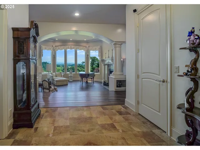 a view of living room with hardwood floor and a view of living room
