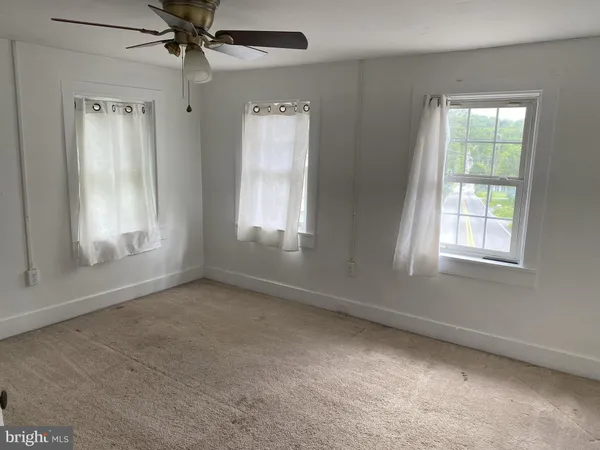 an empty room with a window