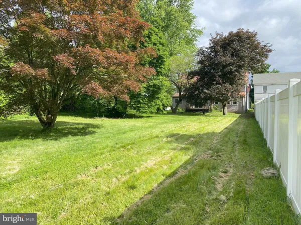 a view of a golf course with a yard
