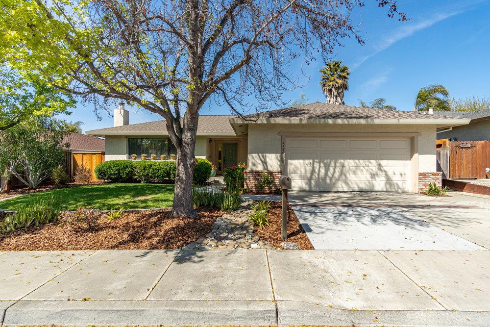 1220 Heather Glen Circle Hollister, CA 95023 - Photo 2 of 41 a view of a house with cars park front of house