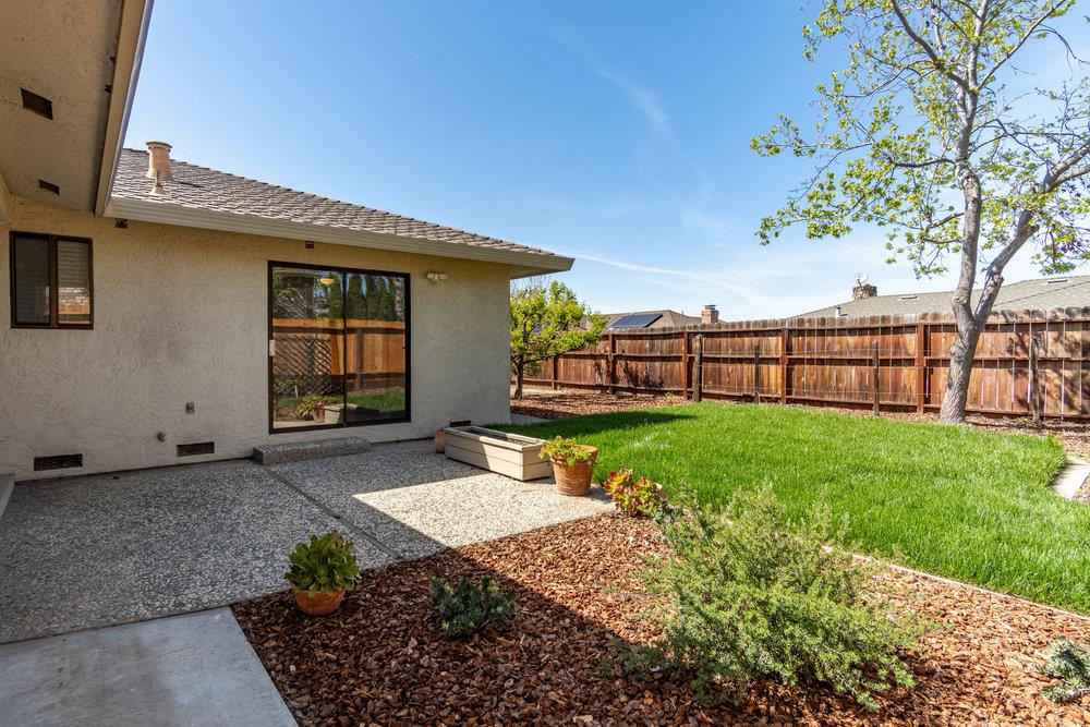 1220 Heather Glen Circle Hollister, CA 95023 - Photo 37 of 41 a front view of a house with garden