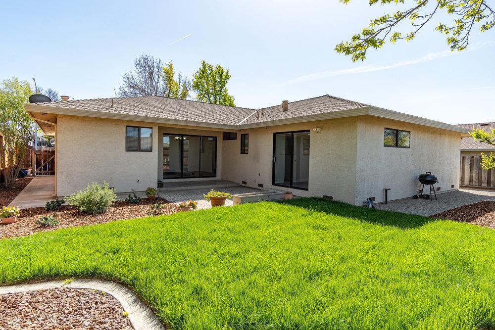 1220 Heather Glen Circle Hollister, CA 95023 - Photo 38 of 41 a front view of house with yard and outdoor seating