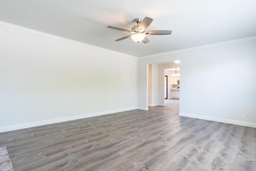 1220 Heather Glen Circle Hollister, CA 95023 - Photo 8 of 41 a view of an empty room with wooden floor
