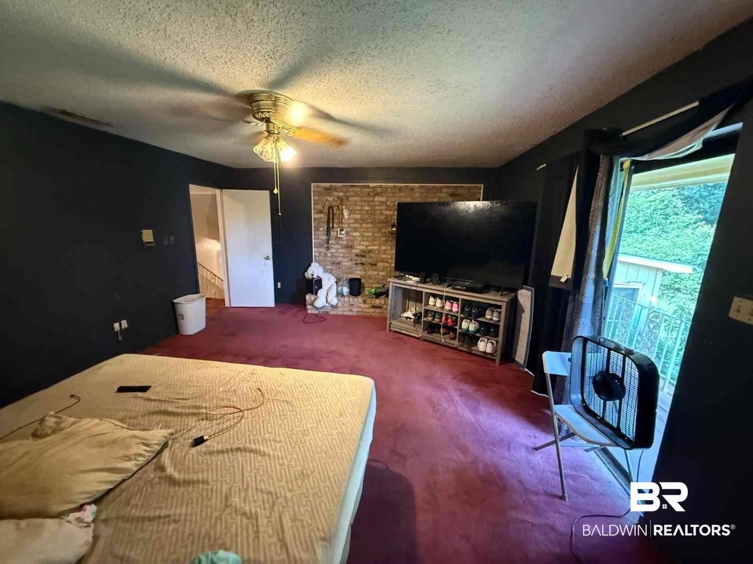 3721 Robertson Court Mobile, AL 36693 - Photo 20 of 22 Bedroom featuring a textured ceiling and a ceiling fan