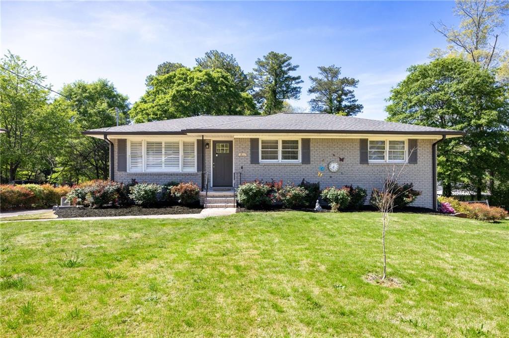 front view of a house with a yard