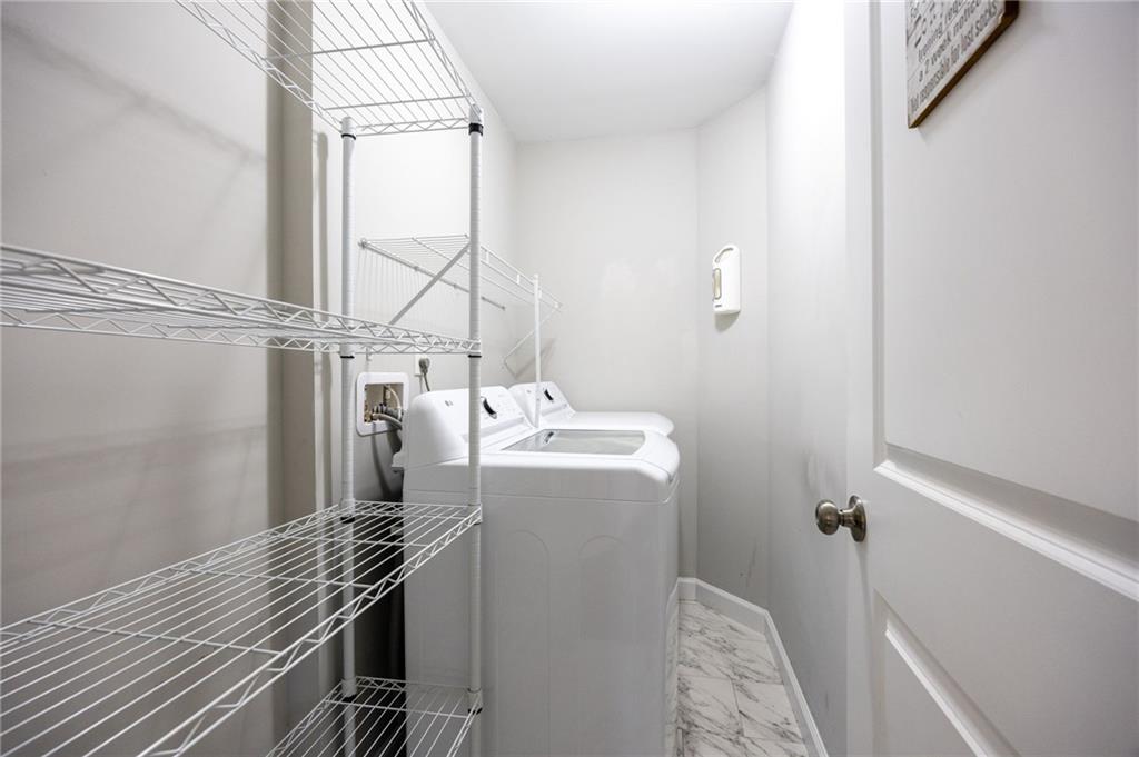45 Smyrna Powder Springs Road Southeast Marietta, GA 30060 - Photo 22 of 45 a bathroom with a bathtub and shower