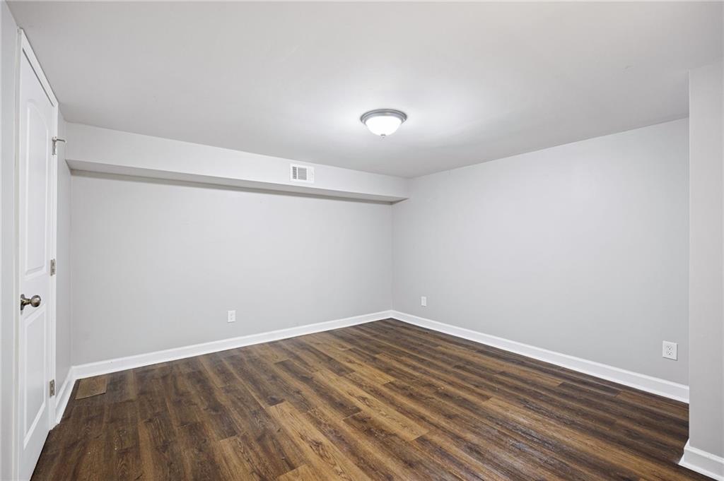 45 Smyrna Powder Springs Road Southeast Marietta, GA 30060 - Photo 29 of 45 a view of room with wooden floor