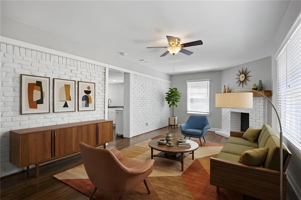 45 Smyrna Powder Springs Road Southeast Marietta, GA 30060 - Photo 3 of 45 a living room with furniture a fireplace and a window