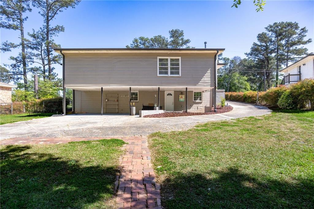 45 Smyrna Powder Springs Road Southeast Marietta, GA 30060 - Photo 37 of 45 a front view of a house with garden