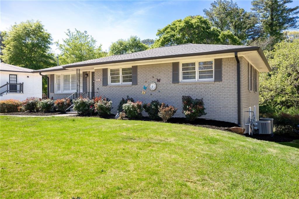 45 Smyrna Powder Springs Road Southeast Marietta, GA 30060 - Photo 43 of 45 a view of a house with backyard and garden