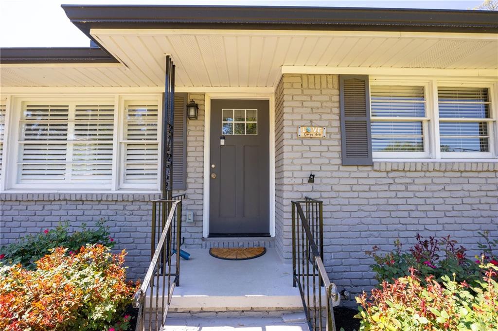45 Smyrna Powder Springs Road Southeast Marietta, GA 30060 - Photo 5 of 45 a front view of a house with outdoor seating