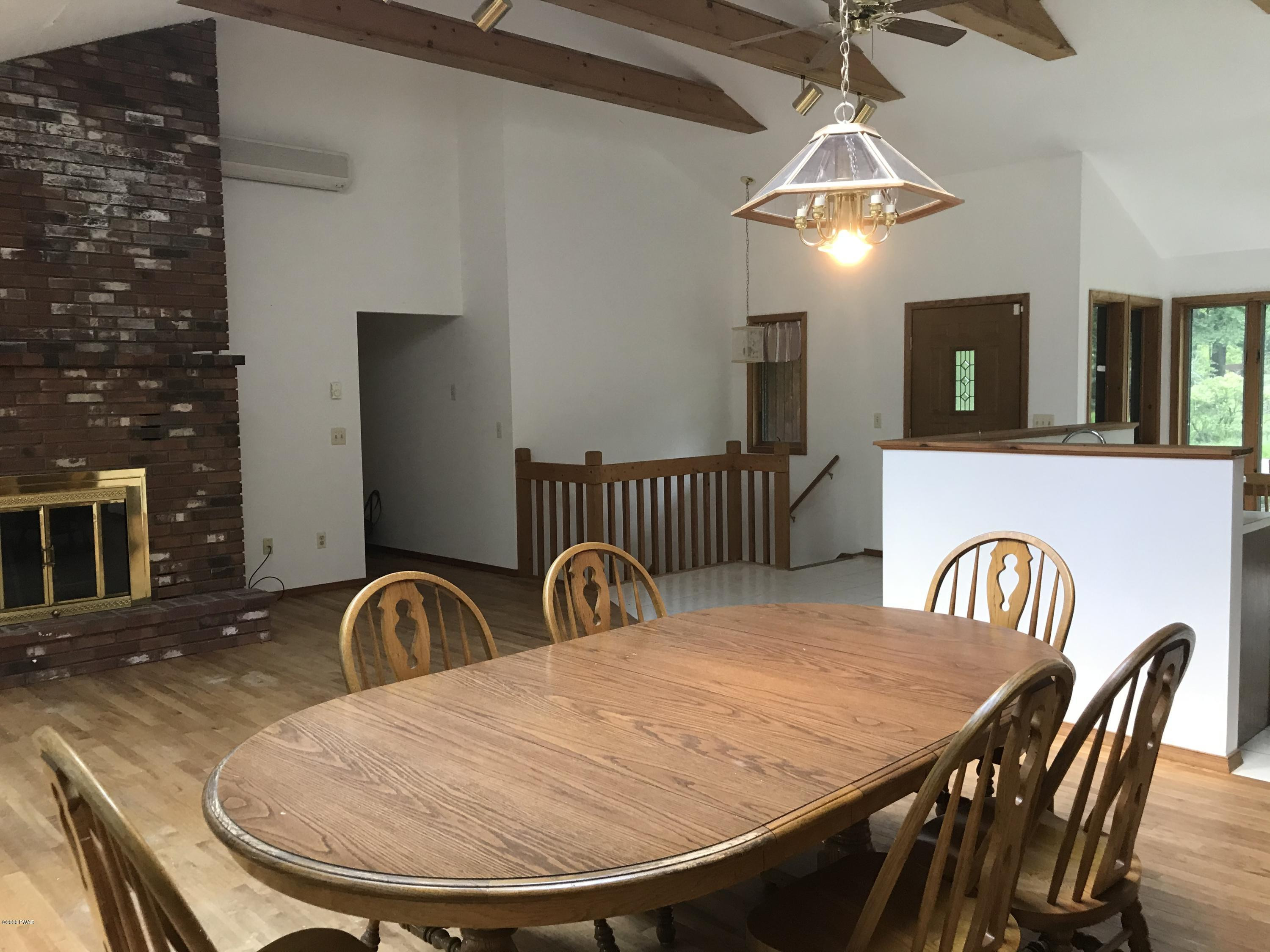 183 Yale Road Milford, PA 18337 - Photo 11 of 26 a view of a dining room with furniture