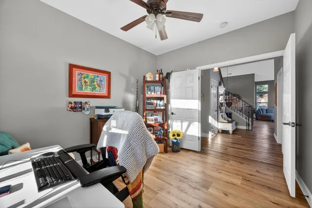 a bathroom with a bathtub a shower a sink and a window