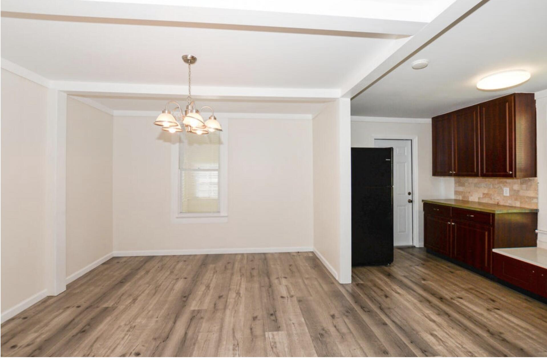 119 South 11th Street Fort Pierce, FL 34950 - Photo 12 of 22 a view of a kitchen from the hallway