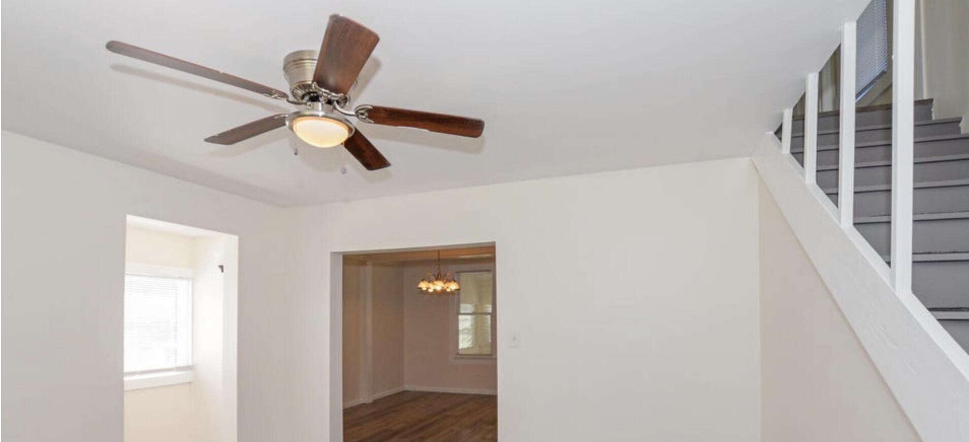 119 South 11th Street Fort Pierce, FL 34950 - Photo 17 of 22 a view of a hallway with a ceiling fan