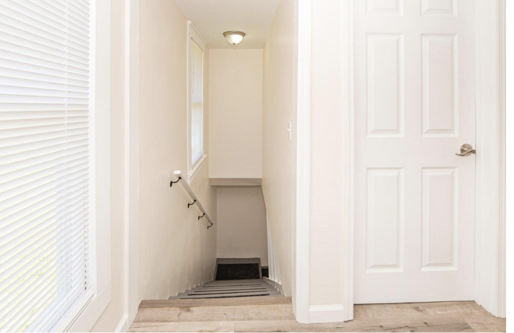 119 South 11th Street Fort Pierce, FL 34950 - Photo 21 of 22 a view of a hallway with staircase