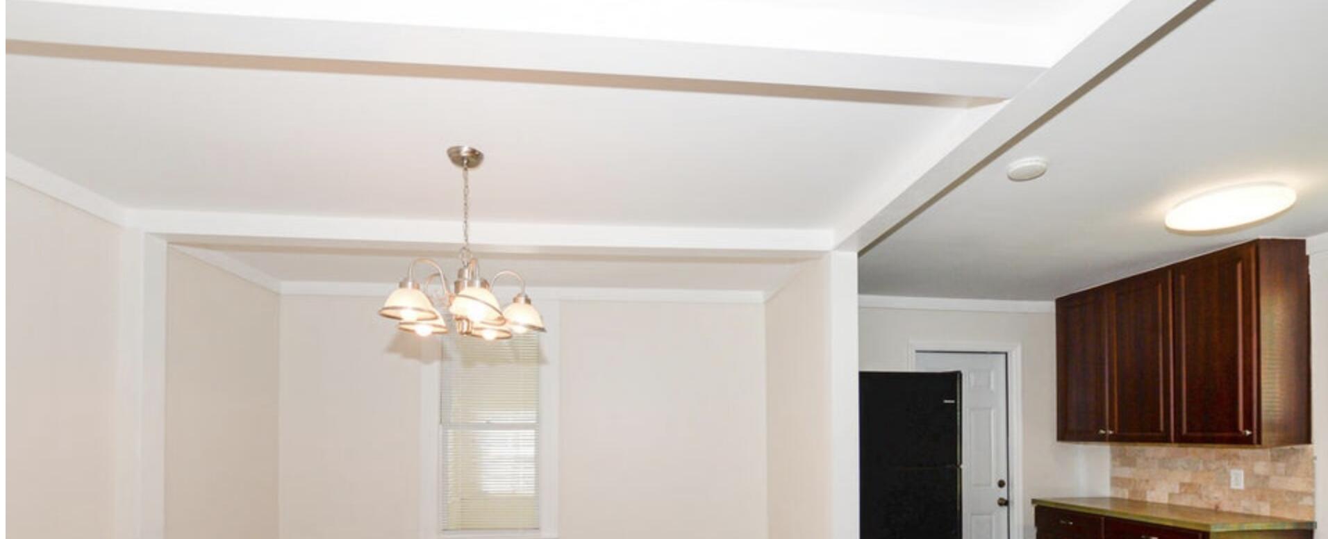 119 South 11th Street Fort Pierce, FL 34950 - Photo 10 of 22 a view of a chandelier in big room with chandelier fan