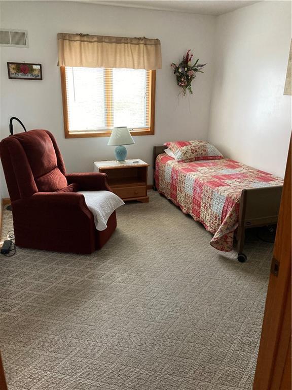 390 Mountain Road Uniontown, PA 15401 - Photo 14 of 24 a bedroom with a bed couch and window
