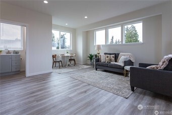 1024 North 8th Street Mount Vernon, WA 98273 - Photo 14 of 37 a living room with furniture and a large window