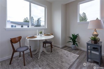 1024 North 8th Street Mount Vernon, WA 98273 - Photo 17 of 37 a view of a dining room with furniture window and wooden floor