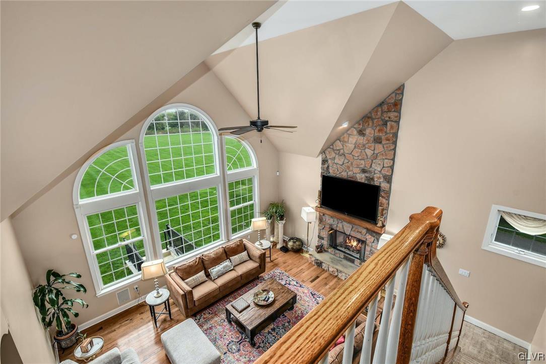1560 Jakes Place Hellertown, PA 18055 - Photo 28 of 38 a living room with furniture a window and a flat screen tv
