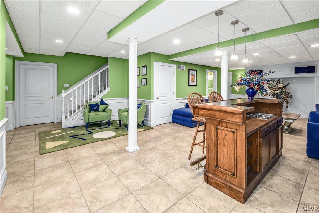 1560 Jakes Place Hellertown, PA 18055 - Photo 30 of 38 a kitchen with stainless steel appliances granite countertop a stove and a refrigerator