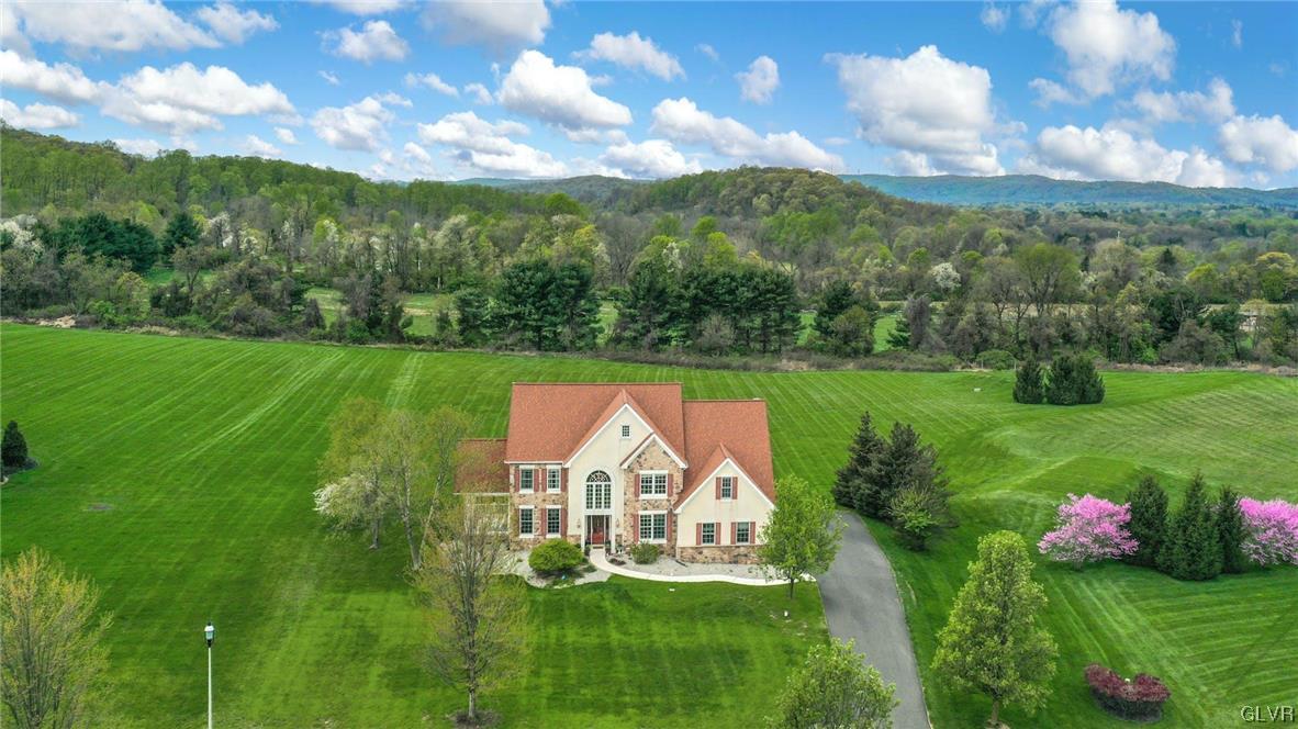 1560 Jakes Place Hellertown, PA 18055 - Photo 4 of 38 a aerial view of a house with big yard