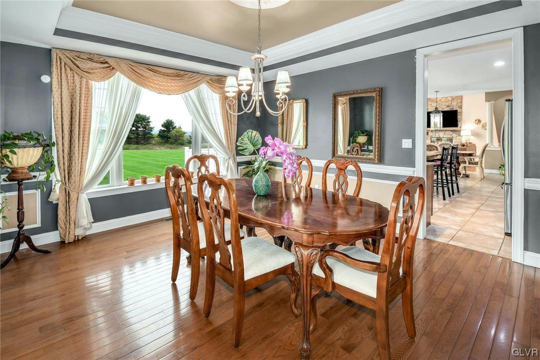 1560 Jakes Place Hellertown, PA 18055 - Photo 9 of 38 a view of a dining room with furniture window and wooden floor