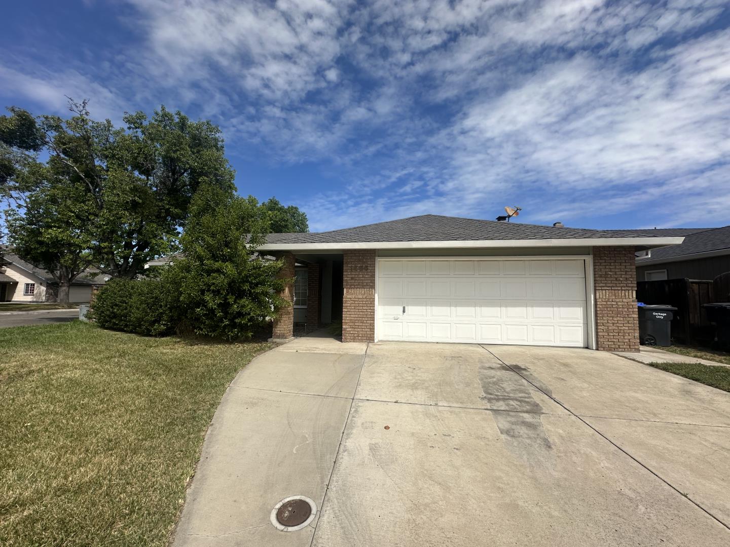 1455 Busca Drive Tracy, CA 95376 - Photo 1 of 1 a view of a house with a yard and garage