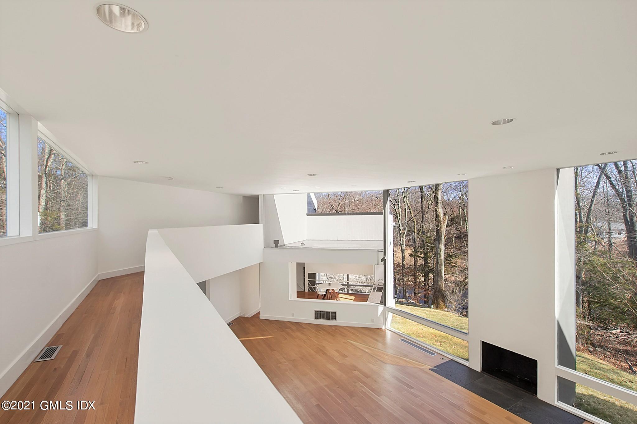 15 Hycliff Road Greenwich, CT 06831 - Photo 18 of 27 a view of a living room with furniture and wooden floor